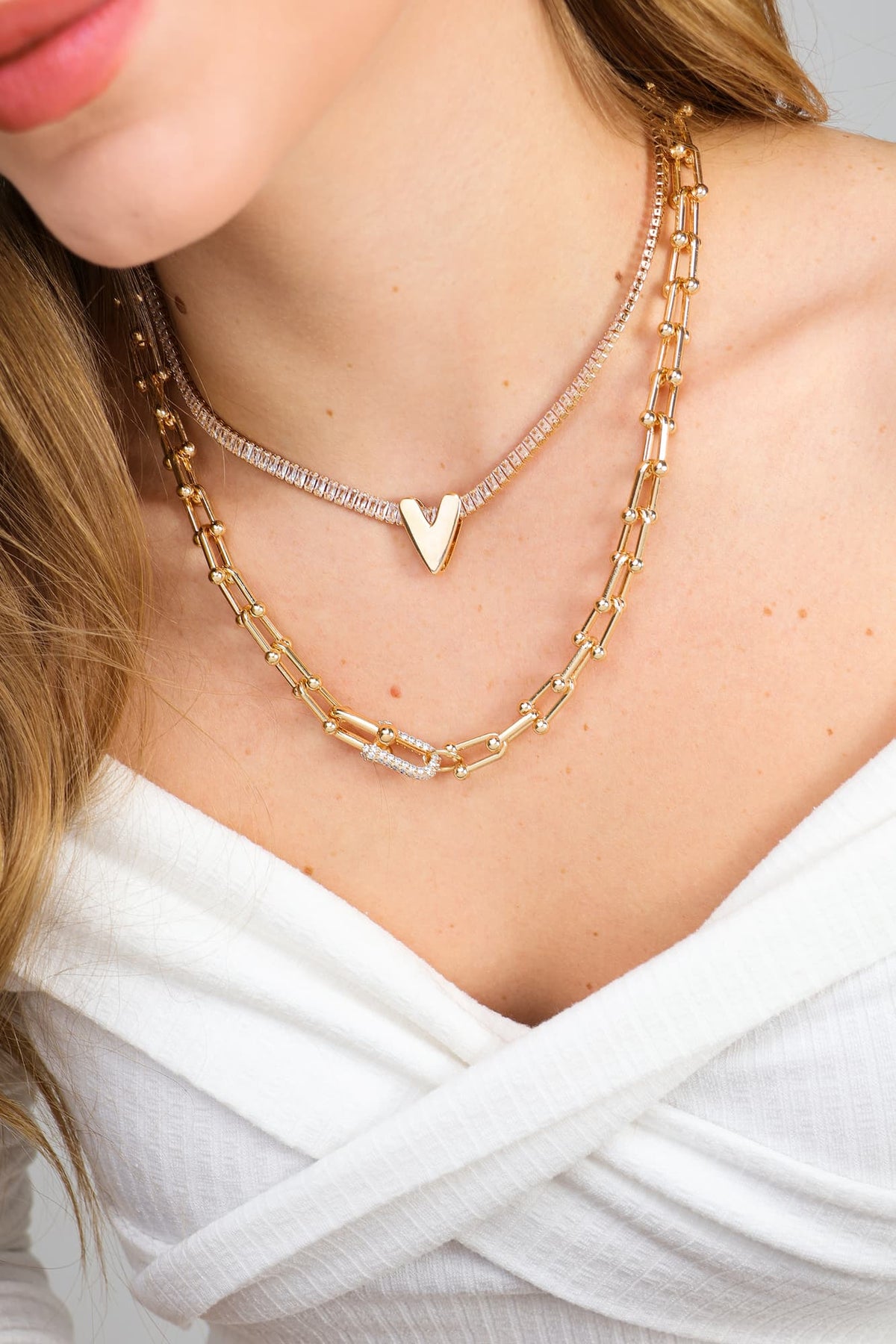 Colar Riviera Cristal Dourado com Pingente Coração Ródio Branco