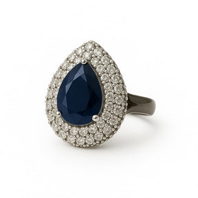 Anel Ródio Negro Cravejado Cristal com Pedra Gota Azul